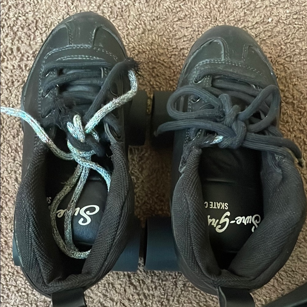 Sure-Grip Black Roller Skates